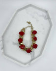 BRACCIALE CON PIETRE ROSSO