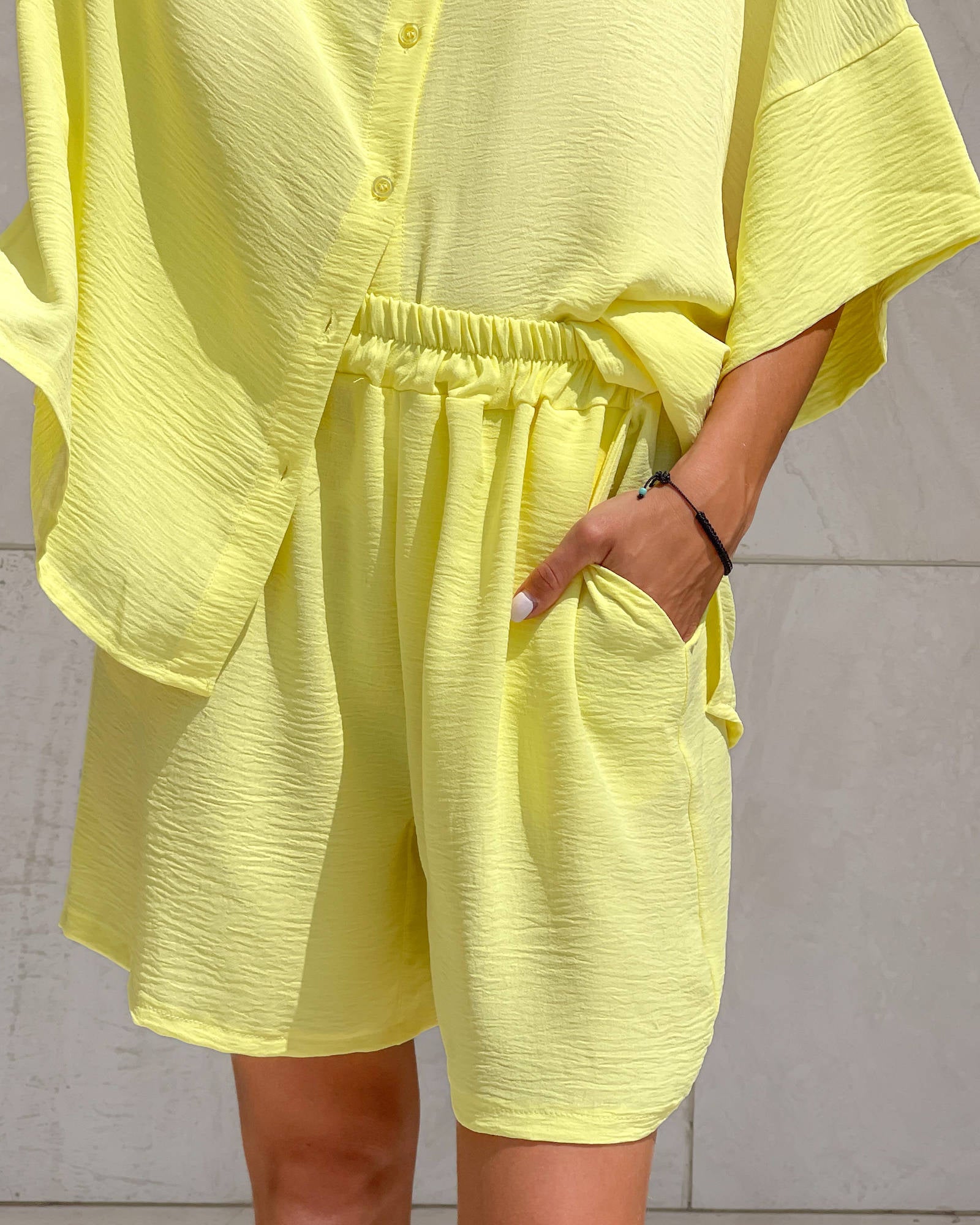 COMPLETO PAROS SHORT GIALLO
