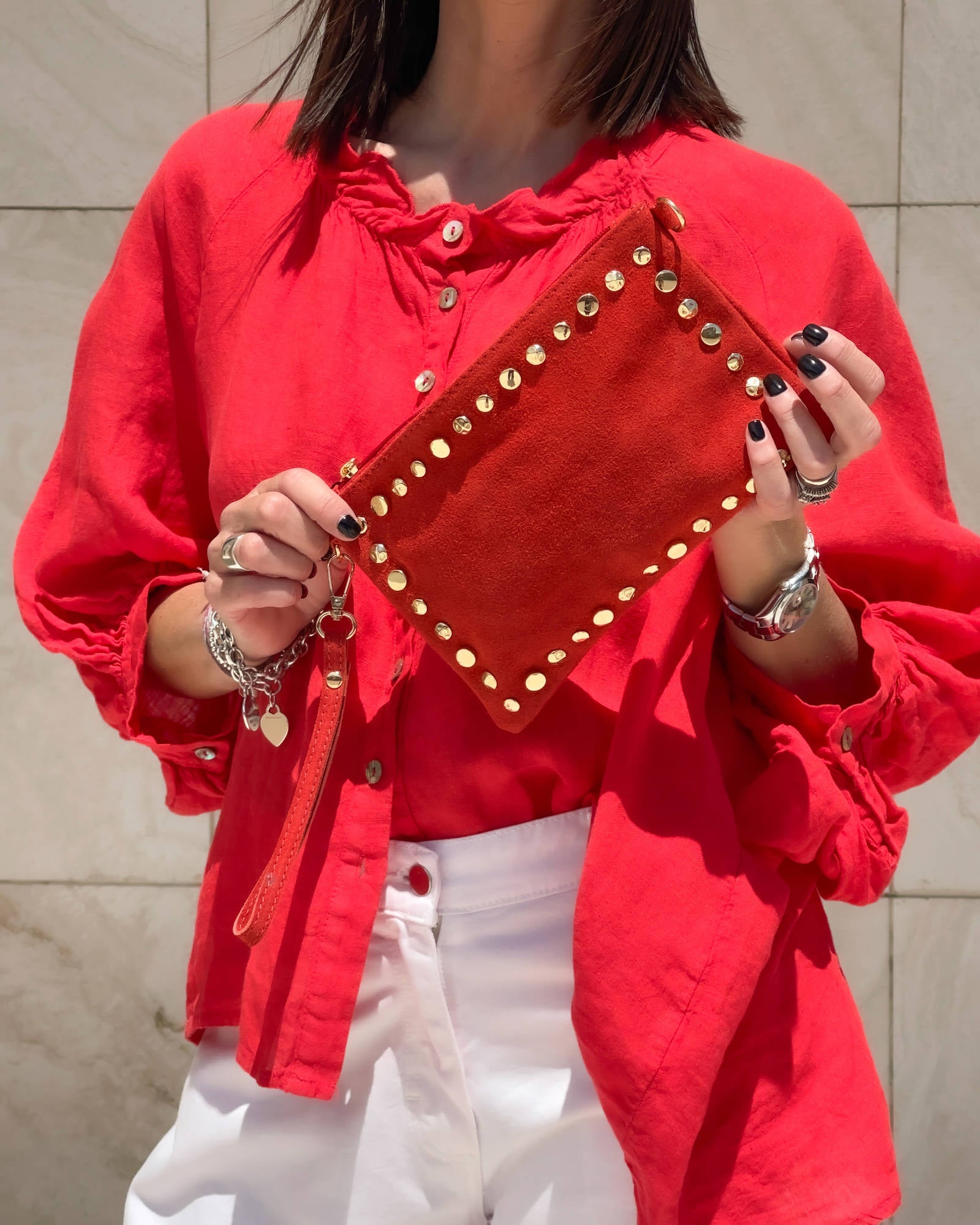 POCHETTINA CON BULLONI ROSSO