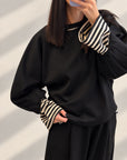 COMPLETO FELPA POLLON NERO