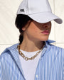 CAPPELLO CON VISIERA OFF WHITE